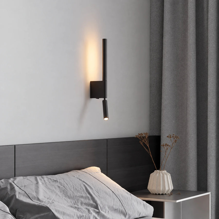 Black bedside reading light in bedroom
