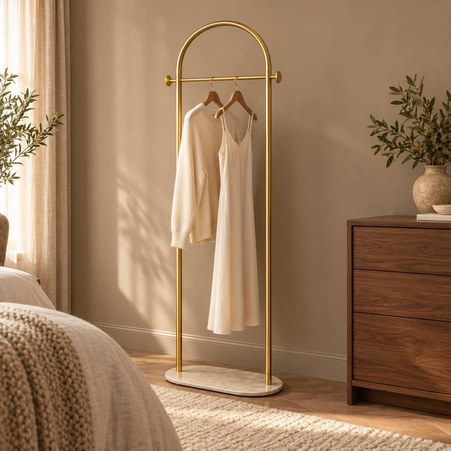 Gold Freestanding Clothes Rack with Arched Rail – 170 cm in a warm modern home setting